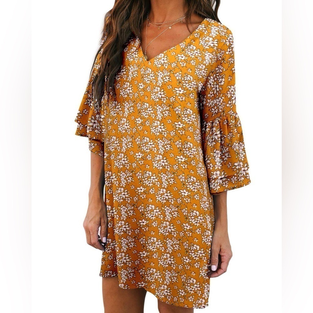 Beautiful new with tag size, medium mustard, yellow, printed mini dress